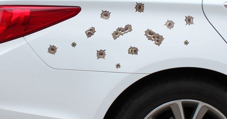 car with Bullet Hole Stickers