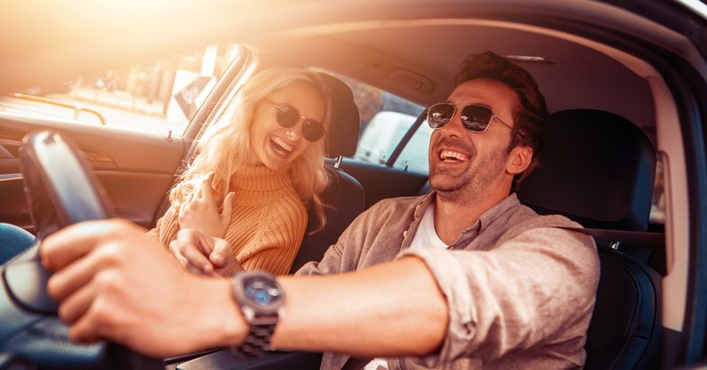 happy young couple enjoying in drive