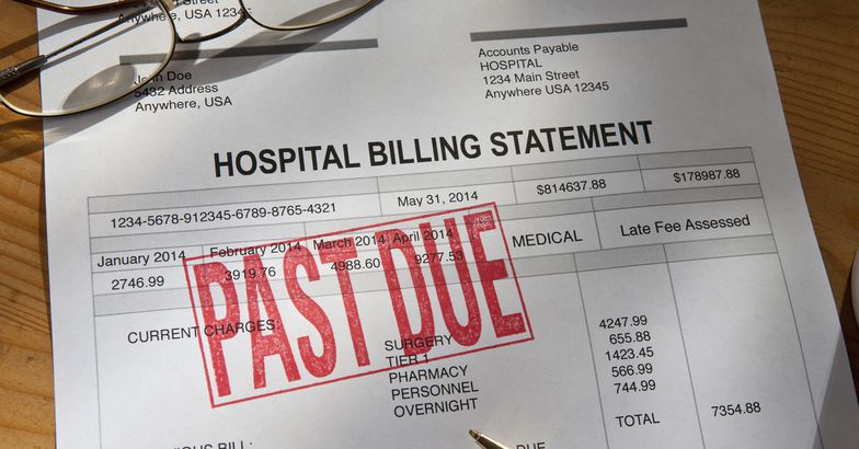 hospital billing statement with past due stamped on the invoice