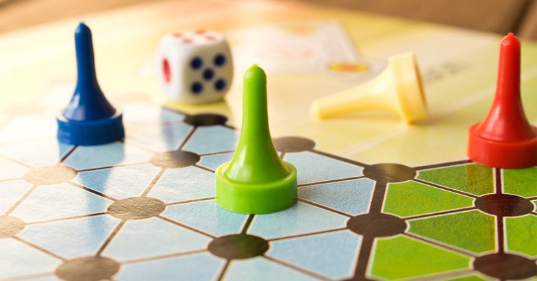 board game pieces and dice
