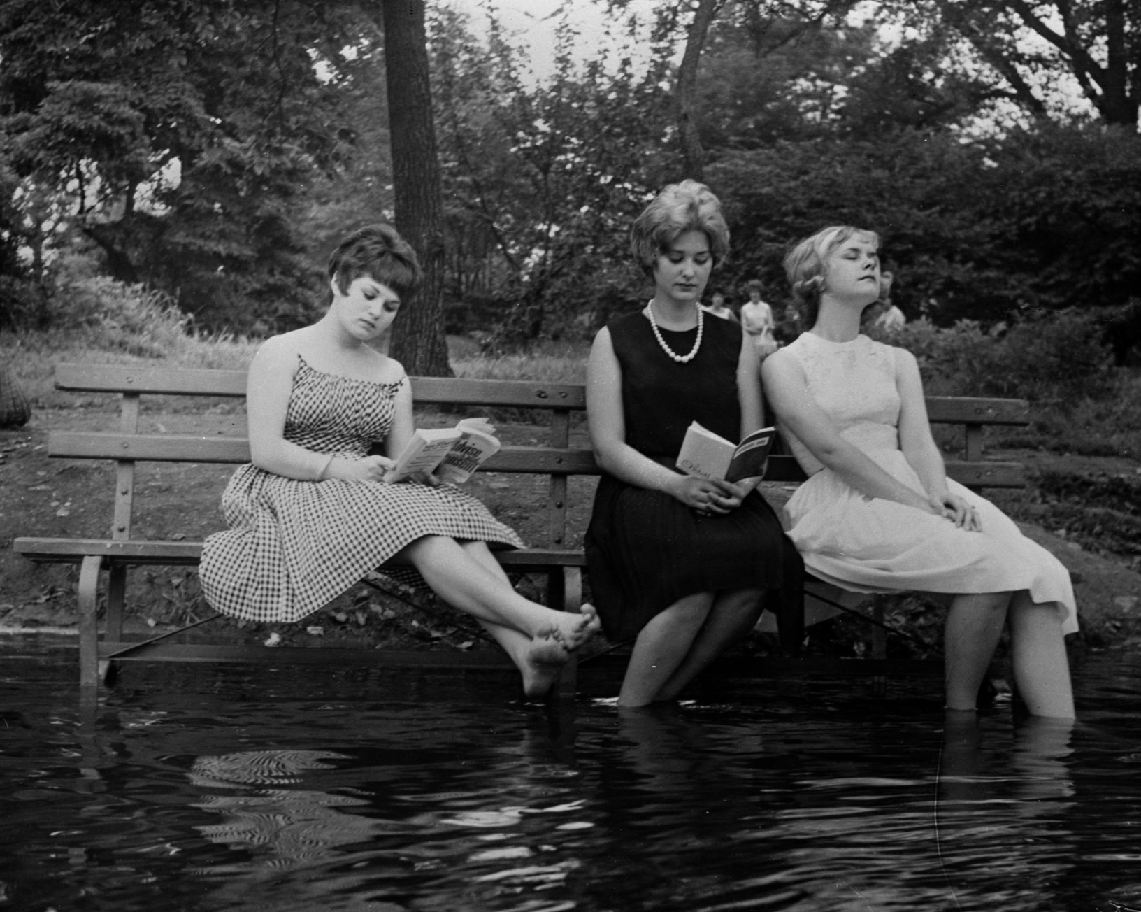 Reading in Central Park during a heat wave in September 1961