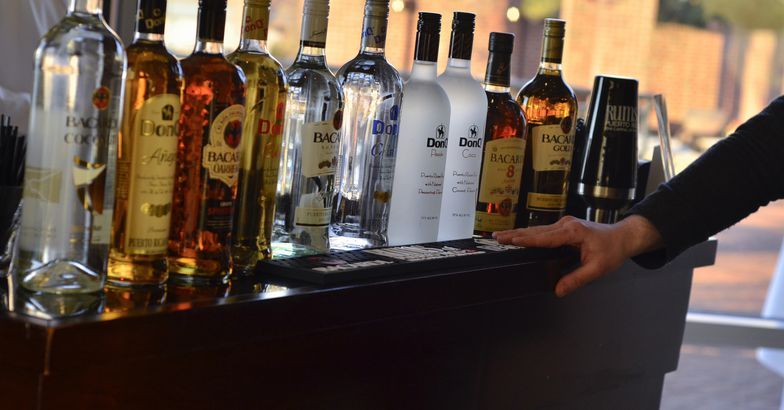 puerto rican rums lined up at bar including bacardi and donq