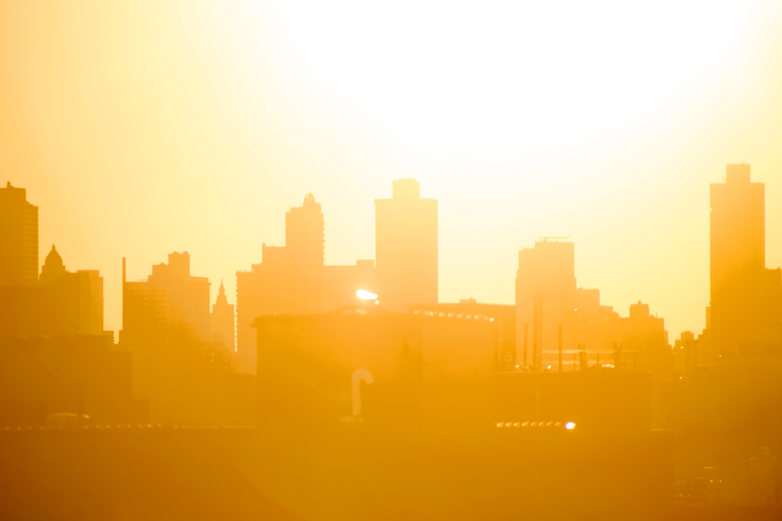 View of city skyline during a heat wave
