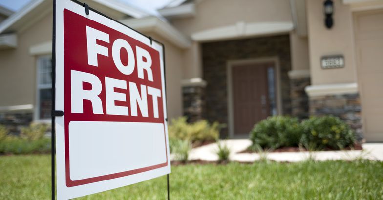 For Rent sign in front of new house