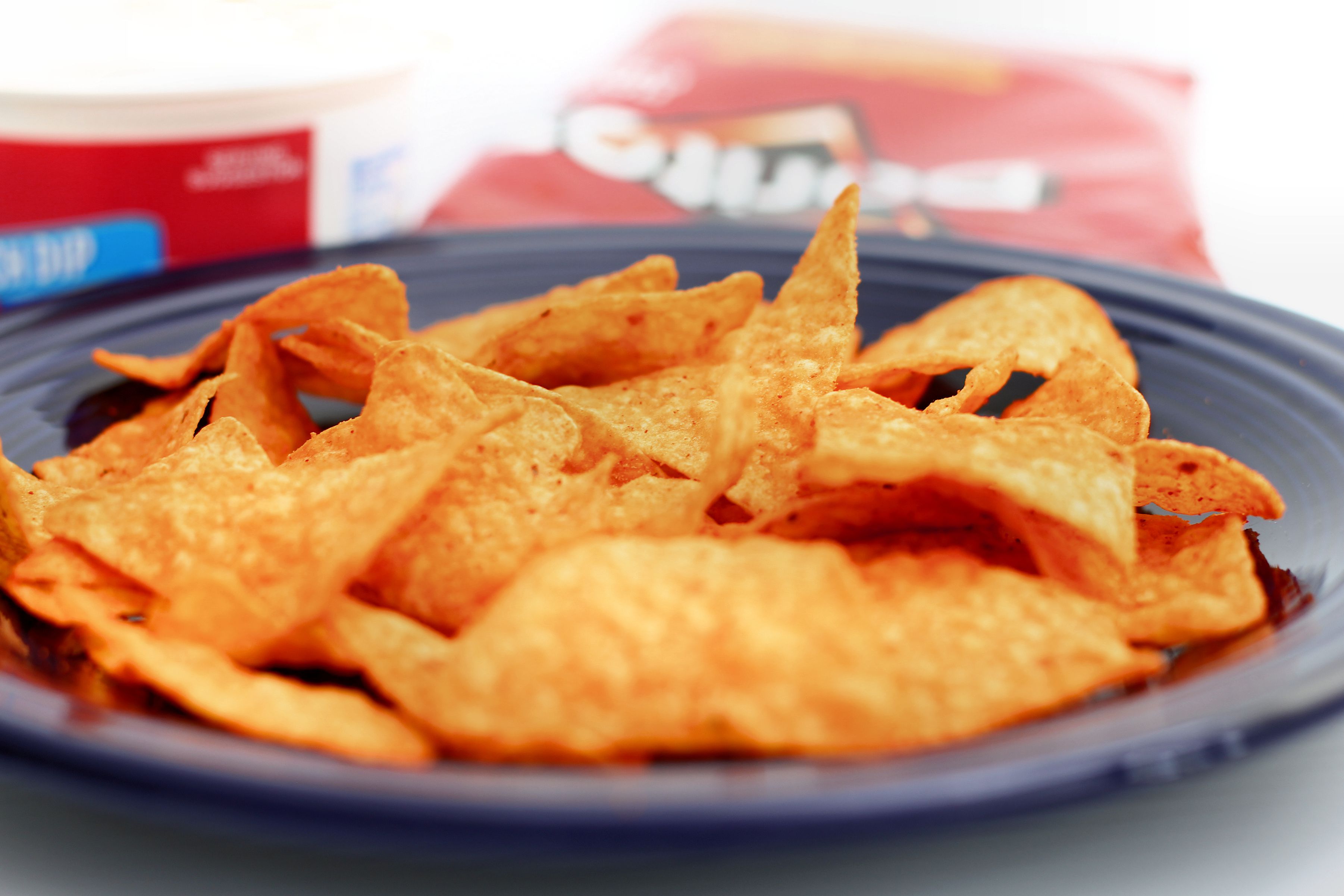 Nacho Cheese Flavor Doritos set out for a party.