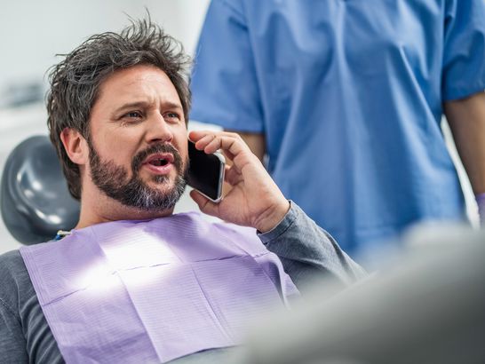 Using phone at dentist