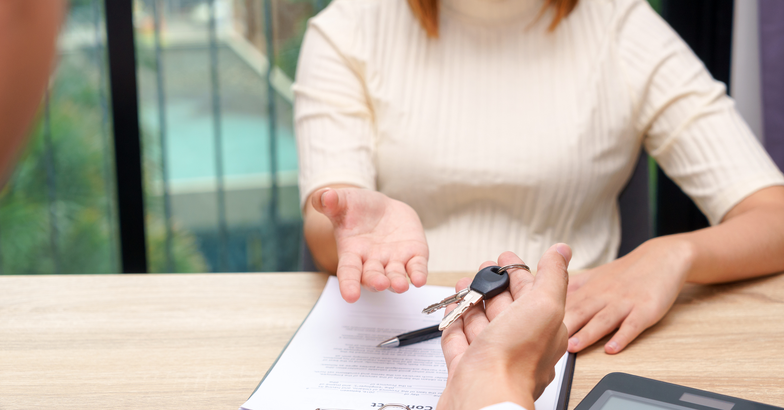 Woman renting a vehicle