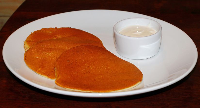 Russian oladii with sour cream