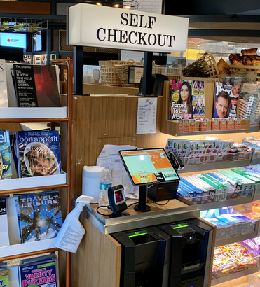 Wonder what it's like to fly during COVID-19? I just did A self-checkout station at a convenience store area in EWR