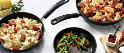 T-Fal 3-Piece Fry Pan Set with food