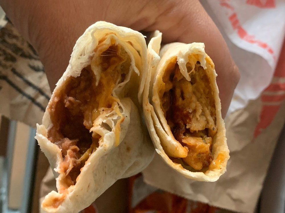 Bean and cheese burrito and a cheddar chicken roller from Del Taco
