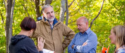 Customers and Surveyors Arguing About Property Measurements