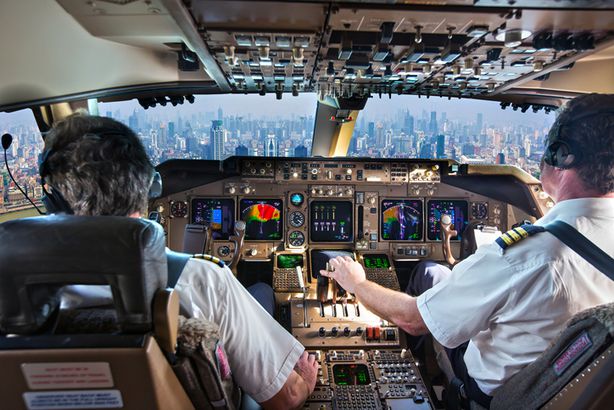 Wonder what it's like to fly during COVID-19? I just did Airplane cockpit members