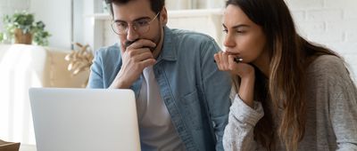 couple looking at computer screen