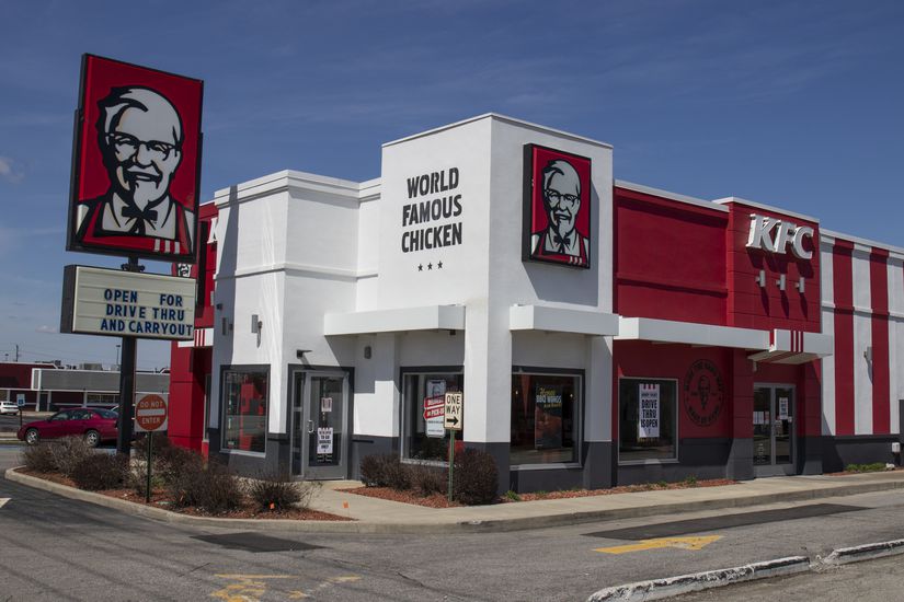 KFC Chicken restaurant. Kentucky Fried Chicken is offering Uber and Door Dash delivery and drive thru service during social distancing.