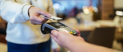 Furniture store owner receives contactless payment due to social distancing