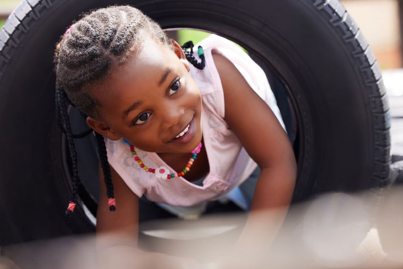 Shot of an adorable little girl playing outside
