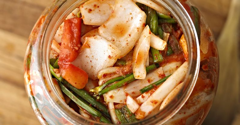 close-up of kimchi in a jar