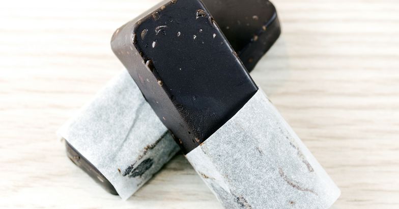 chocolate bars on wooden surface