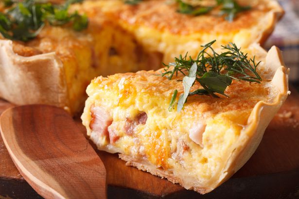piece of French quiche Lorraine macro. horizontal
