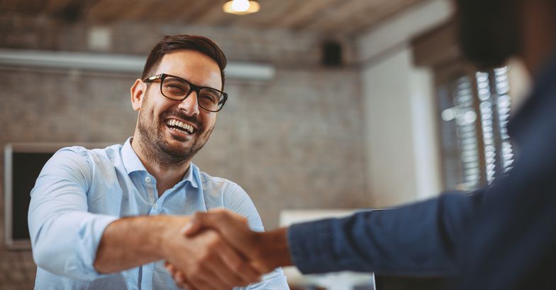 close up of handshake in the office