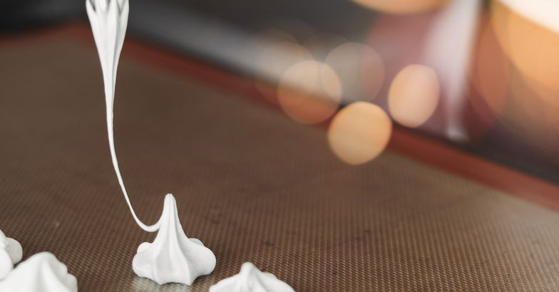 pastry bag forming meringue cookies