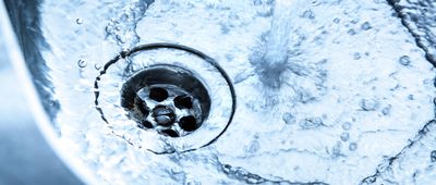 Kitchen sink with running water