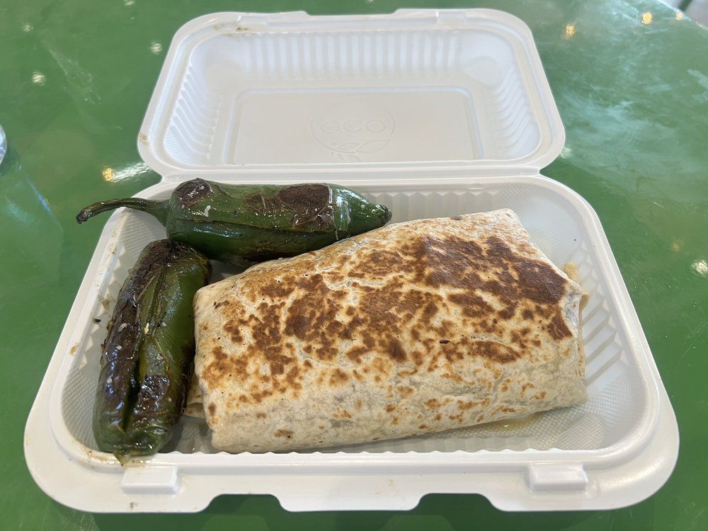 breakfast burrito in a styrofoam shell